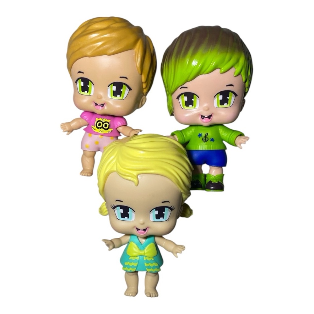 Adorable Trio of Colorful Dolls